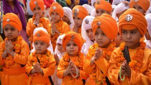 Indian Sikh school children dressed as Punj Pyara participate in a procession from the Sri Akal Takhat at the Sikh Shrine, The Golden Temple in Amritsar on October 8, 2014, on the eve of the birth anniversary of the fourth Sikh Guru Ramdass. Ramdass was born in Lahore in 1574 and is Chauthi Patshahi or the fourth Guru as well as the Guru who established the city of Amritsar. AFP PHOTO /NARINDER NANU (Photo credit should read NARINDER NANU/AFP/Getty Images)