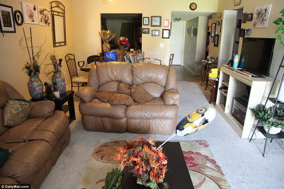 353BF67C00000578-3639587-The_shooter_s_living_room_looks_normal_and_untouched_but_investi-a-2_1465843592164