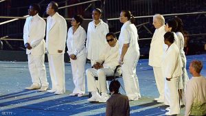 Former boxing champion Mohamed Ali (seated) attends the opening ceremony of the London 2012 Olympic Games on July 27, 2012 at the Olympic Stadium in London. AFP PHOTO / SAEED KHAN (Photo credit should read SAEED KHAN/AFP/GettyImages)