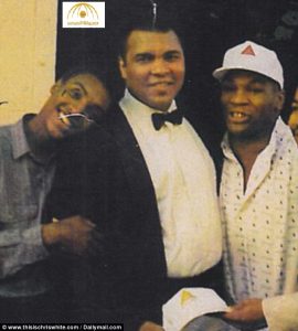 36855C5200000578-0-Ali_Jr_far_left_poses_with_his_father_and_Mike_Tyson_right_He_wa-a-8_1469240084842