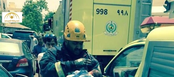 شاهد كيف تصرف رجل الدفاع المدني أثناء انقاذ رضيع من حريق - صورة