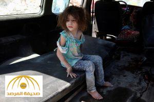 ATTENTION EDITORS - VISUAL COVERAGE OF SCENES OF INJURY OR DEATHAn injured girl sits in a vehicle after surviving double airstrikes on the rebel held Bab al-Nairab neighborhood of Aleppo, Syria, August 27, 2016. REUTERS/Abdalrhman Ismail