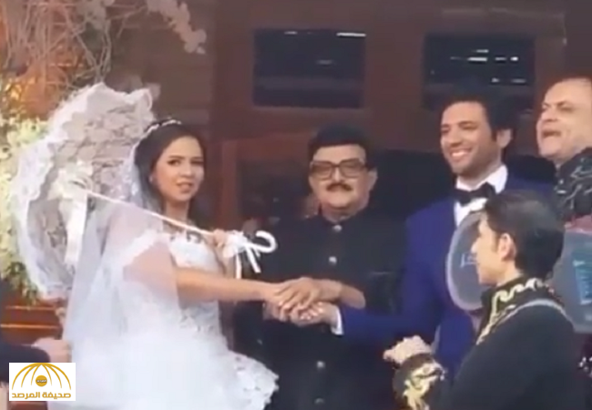 بالفيديو.. شاهدوا كيف كسرت ايمي سمير غانم التقاليد في حفل زفافها من حسن الرداد