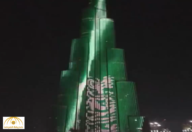 بالفيديو..لقطة مبهرة..علم السعودية يزين برج خليفة