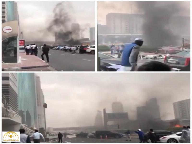 سقوط رافعة في دبي .. بالفيديو : احتراق ثلاث سيارات بشارع الشيخ زايد