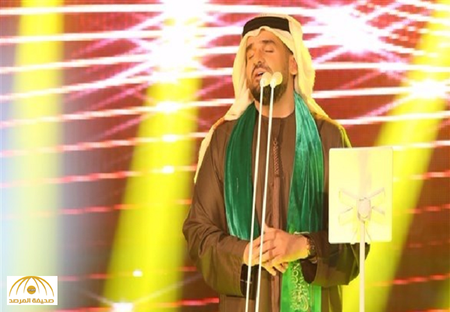 حسين الجسمي يتوشح بالعلم السعودي في حفله بالبحرين