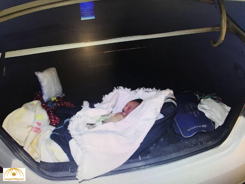 "رضيع" متوفى بـ"حقيبة سفر" مغطى بملابس نسائية داخل شنطة أجرة-صورة