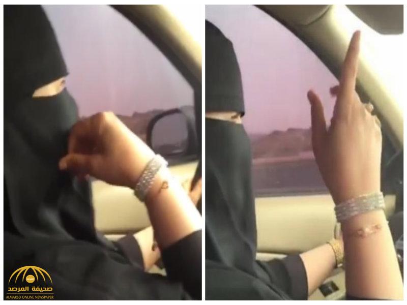 شاهد .. "سعودية مبرقعة" تقود سيارة وتلوح بيديها  على أنغام  الشيلة