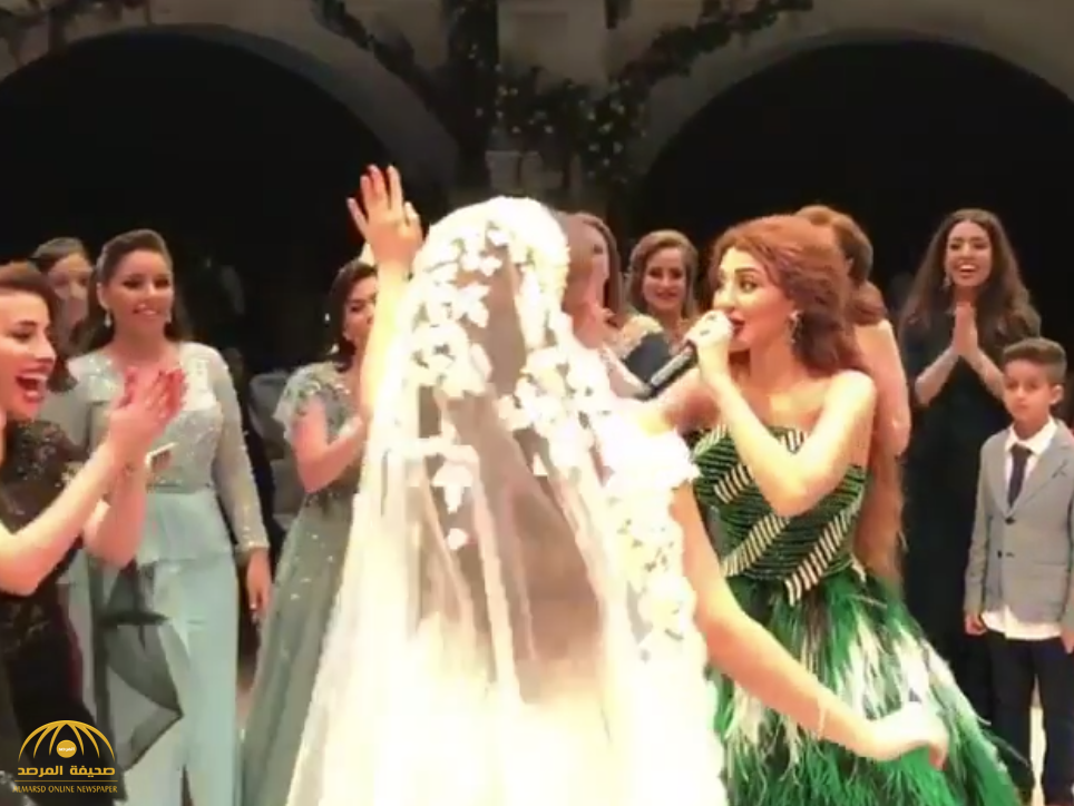 بالفيديو :  "ميريام فارس" تؤدي رقصة مثيرة في حفل زفاف.. شاهد ردة فعل العروس!