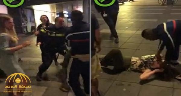 بالفيديو .. شرطي يعتدي على فتاة بالضرب و يسقطها أرضاً أمام المارة