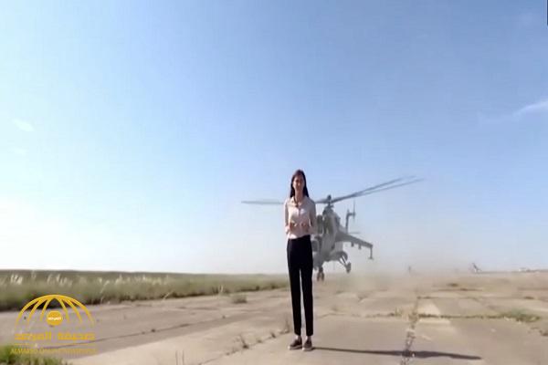 شاهد: مروحية عسكرية كادت تطيح برأس مراسلة روسية في الهواء!