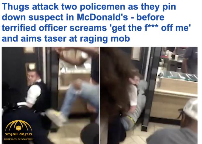 "وضع المسدس فوق رأسه" .. شاهد ضابطان يحاولان السيطرة على "مشتبه به" داخل مطعم ماكدونالدز !