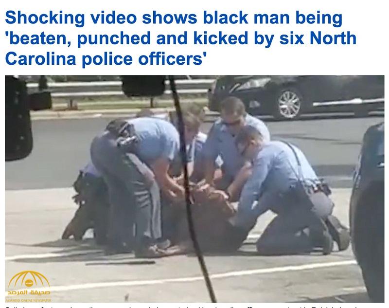 شاهد .. كيف تعامل 6 عناصر من الشرطة الأمريكية مع رجل أسود بعد القبض عليه !