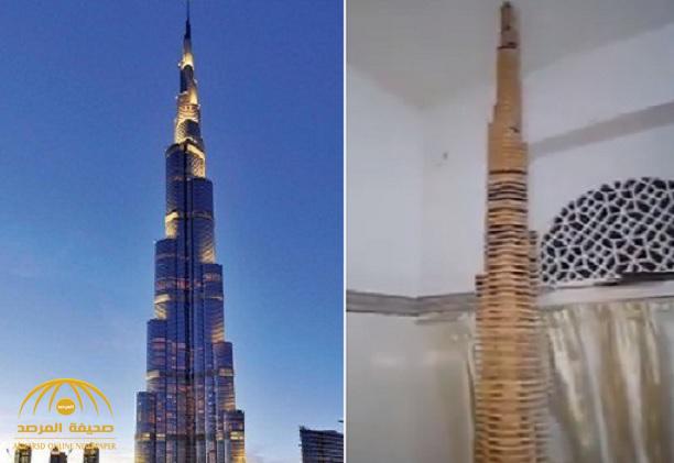 شاهد: يمني يبدع في تصميم "برج خليفة" بـ"أوراق الكرتون"