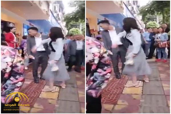 شاهد: فتاة صينية تصفع شابا 52 مرة على وجهه في مكان عام .. وعند حضور الشرطة فاجأهم بالسبب !