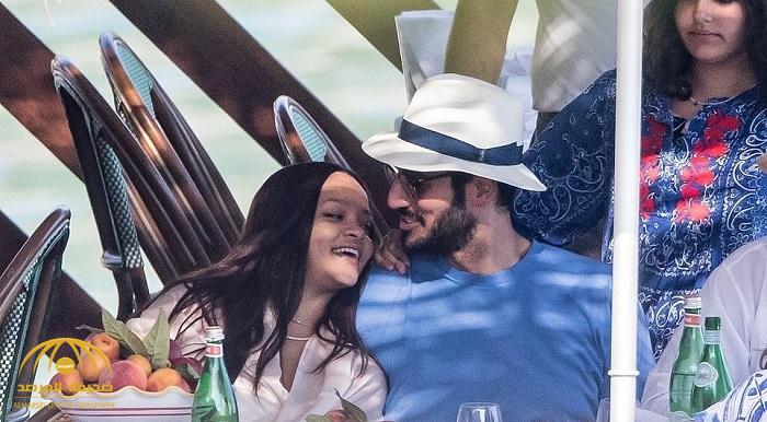 شاهد بالصور  : " حسن جميل " مع عشيقته الفنانة الأمريكية  "ريهانا" تداعبه أثناء نزهة بحرية في إيطاليا