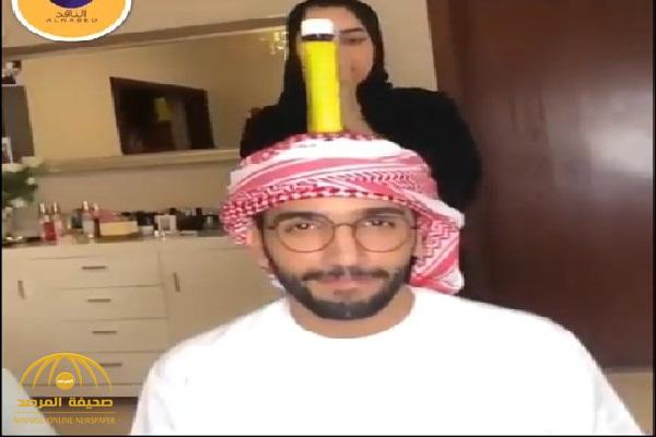 شاهد .. الفنانة الإماراتية "مشاعل الشحي " تتحدى غطاء الزجاجة على رأس زوجها !
