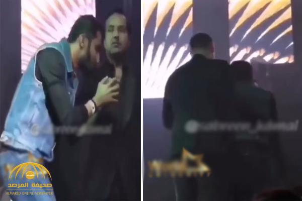 بالفيديو: شاب يفاجئ "راشد الماجد" على المسرح بلندن ويقبل يده .. شاهد: رد فعل الأخير!