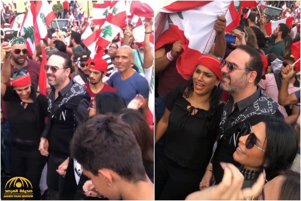 شاهد: الفنان وائل جسار وزوجته يرقصان "الدبكة" وسط مظاهرات لبنان!