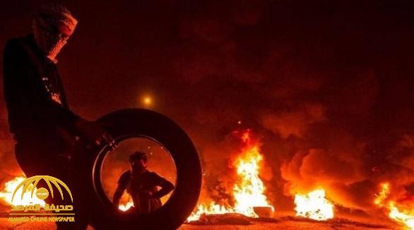 متظاهرون عراقيون يحرقون مقار الأحزاب التابعة لإيران  ويقطعون الطرق بالإطارات المشتعلة !