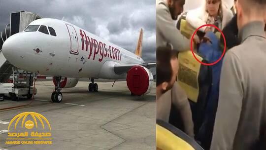 شاهد .. ردة فعل ركاب طائرة في اسطنبول بعد إعلان امرأة منتقبة أنها تحمل قنبلة !