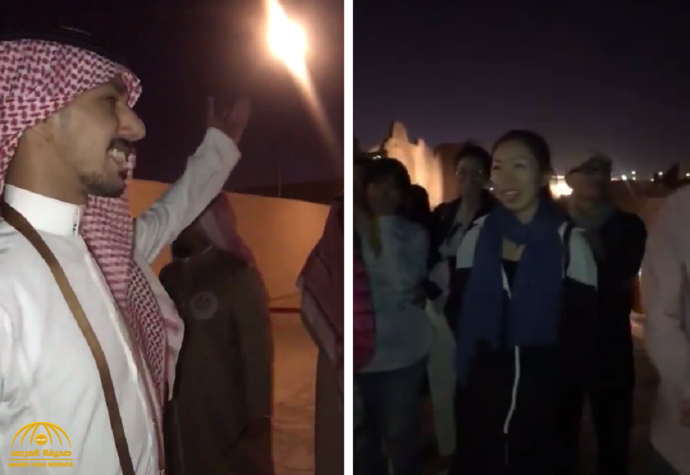 شاهد ...  شاب سعودي يثير اعجاب المغردين بعد استقباله لسياح صينيين في موسم الدرعية  !