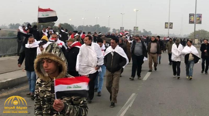 شاهد : أنصار مقتدى الصدر يرتدون "أكفانهم" ويتوجهون لتظاهرة مليونية للمطالبة بخروج القوات الأمريكية