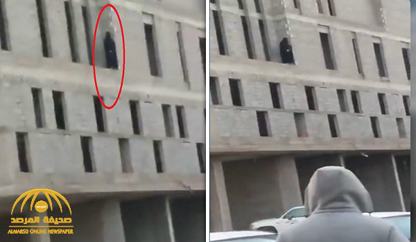 شاهد.. فتاة تحاول الانتحار من أعلى حافة مبنى.. وتصرخ: "دخلوني السجن.. مابيكم أنتم مو بشر".