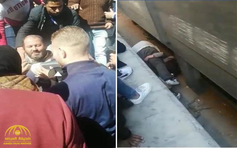 سكة الحديد المصرية تعاقب الأب الشجاع بعدما أنقذ ابنته من دهس قطار مسرع بالغرامة !
