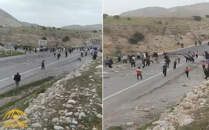 شاهد : إيرانيون يغلقون الطرق ويقذفون القادمين من المحافظات الأخرى بالحجارة خوفاً من كورونا