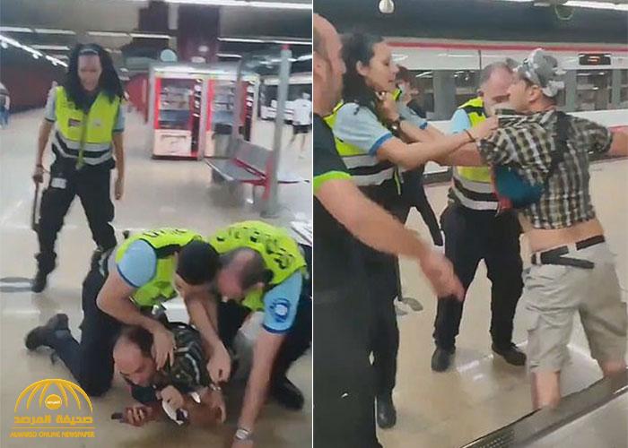 شاهد: الشرطة الإسبانية تضرب ركاب محطات القطارات لعدم ارتدائهم "الكمامات"