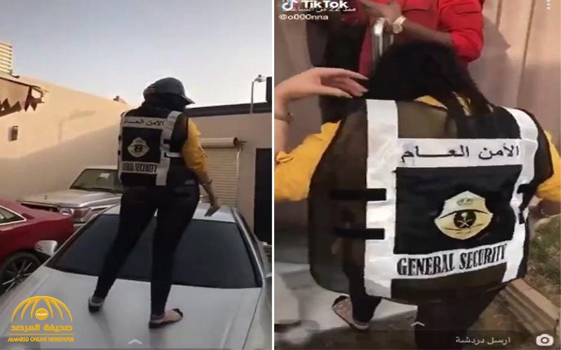 ضبط فتاة ترقص على سيارة مرتدية سترة تابعة للأمن العام داخل استراحة - فيديو