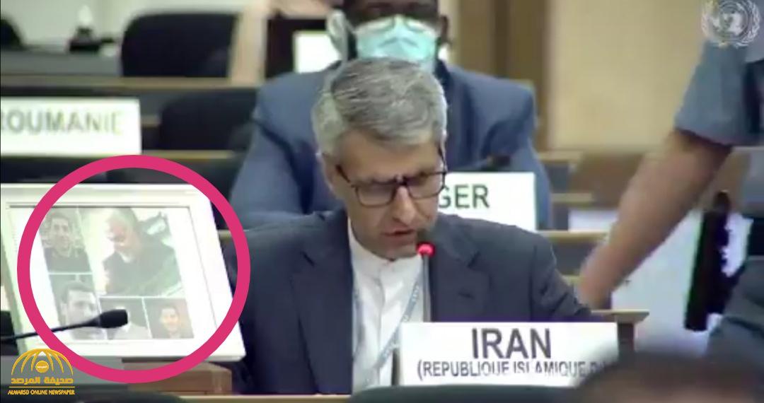 شاهد .. رجل أمن يحرج مندوب إيران بالأمم المتحدة بعدما وضع صورة قاسم سليماني أمامه