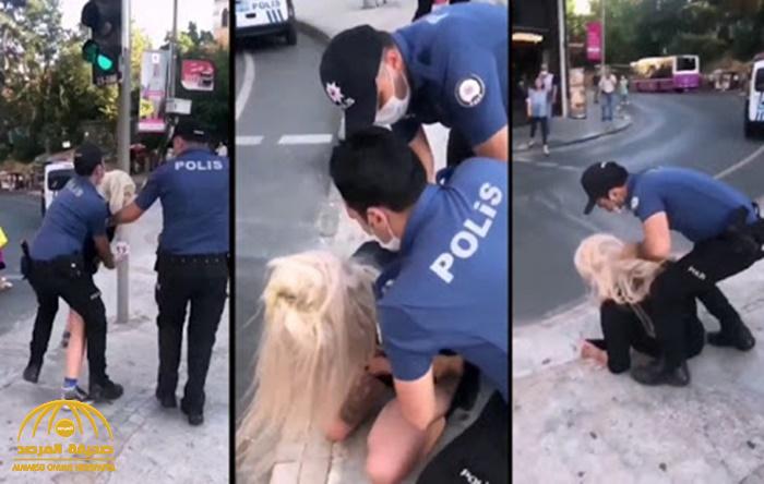 شاهد : الشرطة التركية يعتدون على فتاة بطريقة عنيفة !