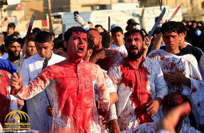 شاهد: عراقيون شيعة يضربون أنفسهم بالسيوف والسلاسل بمناسبة ذكرى عاشوراء