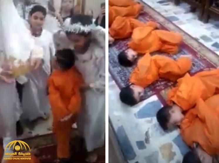 تداول "فيديو" لأطفال داخل كنيسة مصرية  يمثلون مشهد "ذبح" داعش للأقباط في ليبيا يثير جدلا !