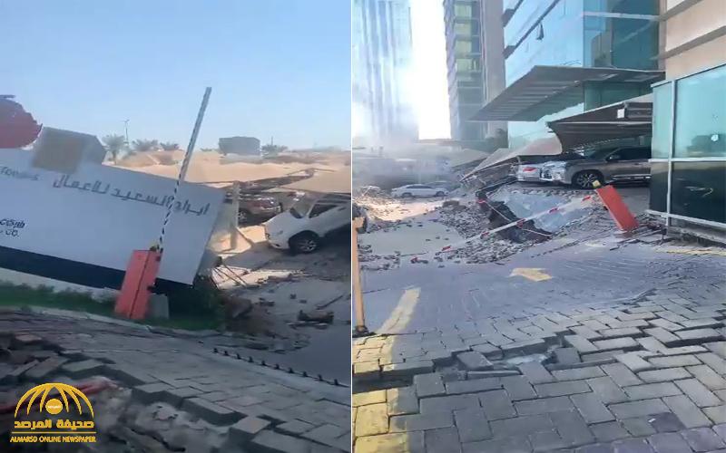 بالفيديو والصور: هبوط أرضي أمام  برج سكني في مواقف السيارات بالخبر