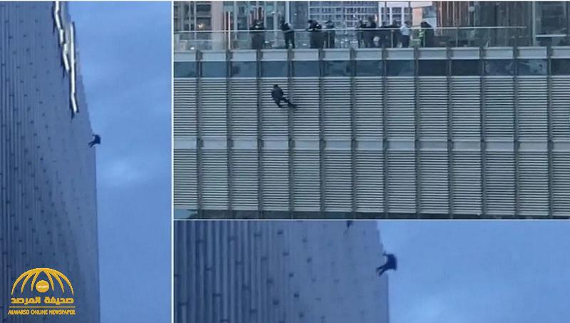 شاهد .. شاب يتدلى بحبل من الطابق 16 ببرج ترمب ويهدد بالانتحار إذا لم يتم تنفيذ طلبه!