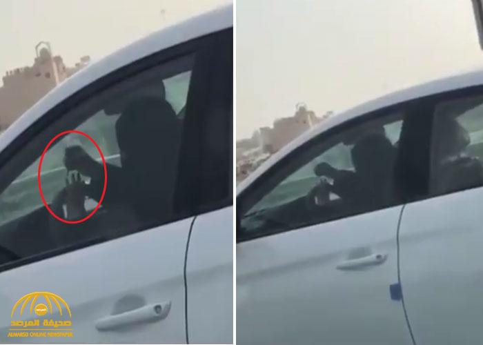 شاهد: سيدة أثناء القيادة تتوقف عند الإشارة لتضع "المناكير "!