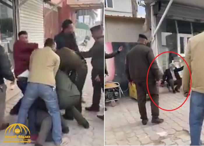 شاهد: عراقي يمسك رشاش "كلاشينكوف" ويحاول الانتحار.. والسبب غريب "لا يخطر على بال"!