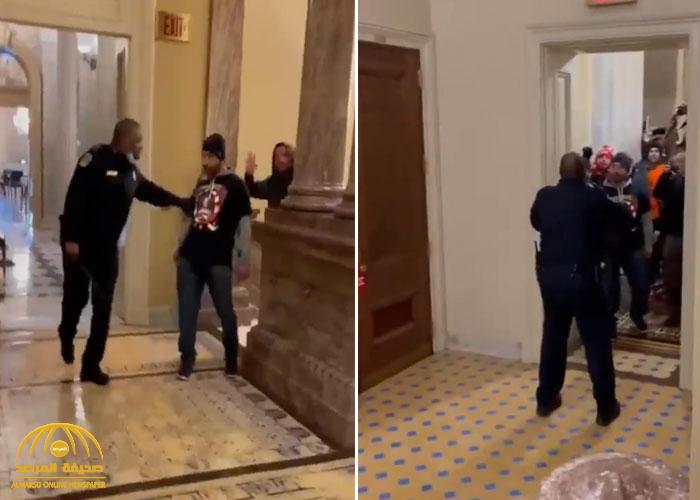 شاهد.. شرطي أمريكي يهرب داخل أروقة مبنى الكونجرس بعد ملاحقته من أنصار "ترامب"