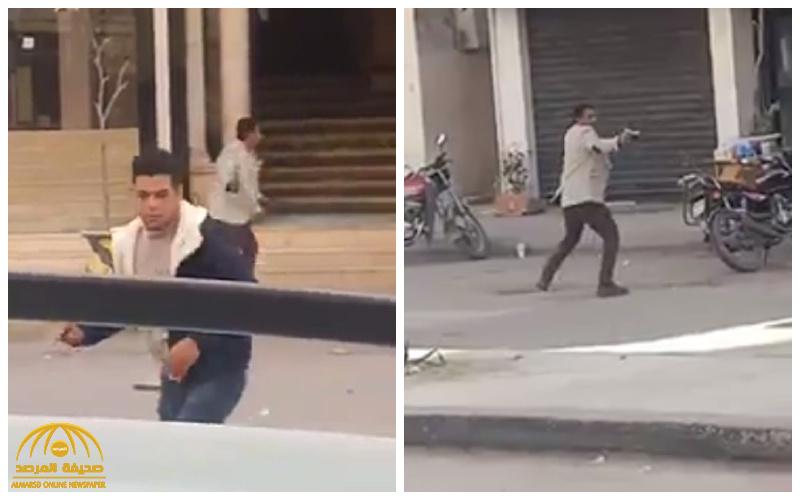 شاهد : فيديو صادم لمصري يطلق النار على المارة في الشارع  بسبب زوجته!