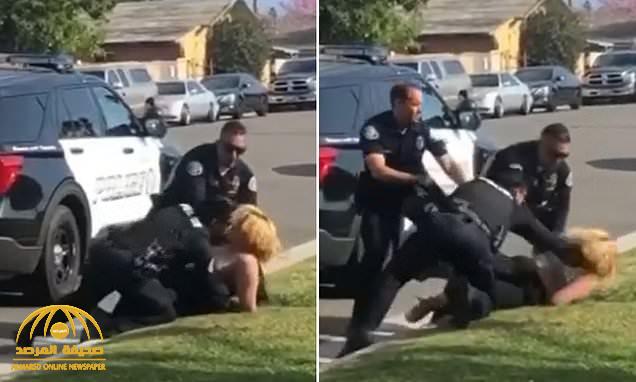 "اعتداء وحشي".. شاهد : شرطي أمريكي يقيد امرأة وينهال عليها بالضرب وسط شارع بـ"كاليفورنيا"