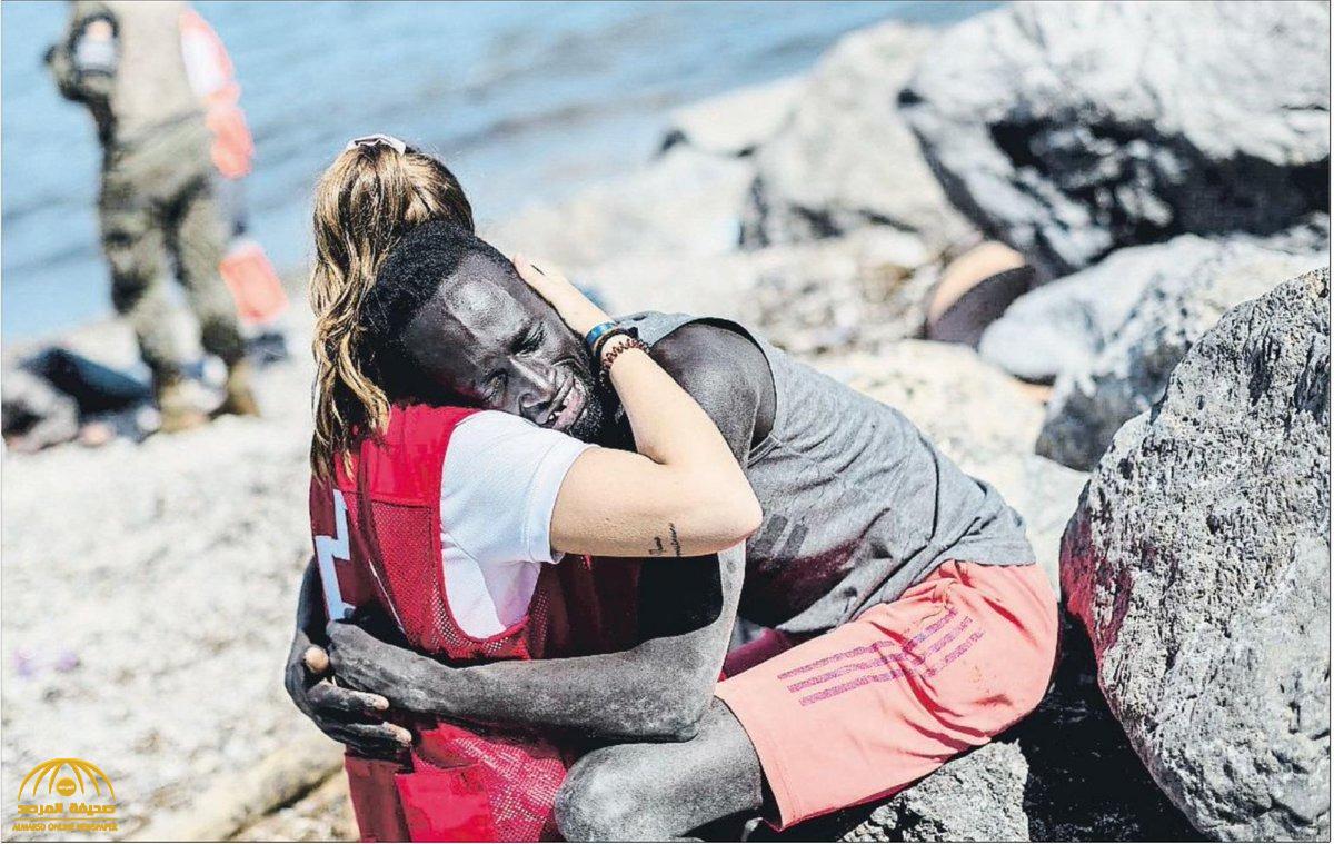 شاهد.. سر فيديو "العناق الحار" بين ناشطة بالصليب الأحمر وشاب أفريقي على شواطئ إسبانيا