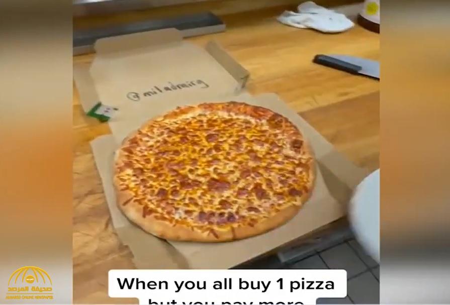 "خدعة" لا تخطر على بال.. شاهد: كيف سرق لص أكبر قطعة "بيتزا" دون أن يتغير شكلها!