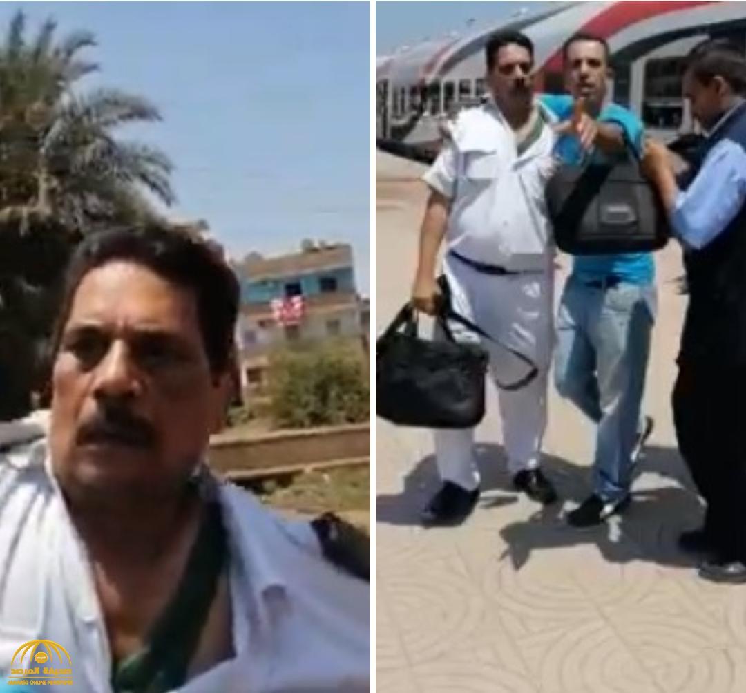 شاهد : الاعتداء على شرطي مصري في محطة قطار .. وأحد الموجودين: عيب تضربوا راجل كبير