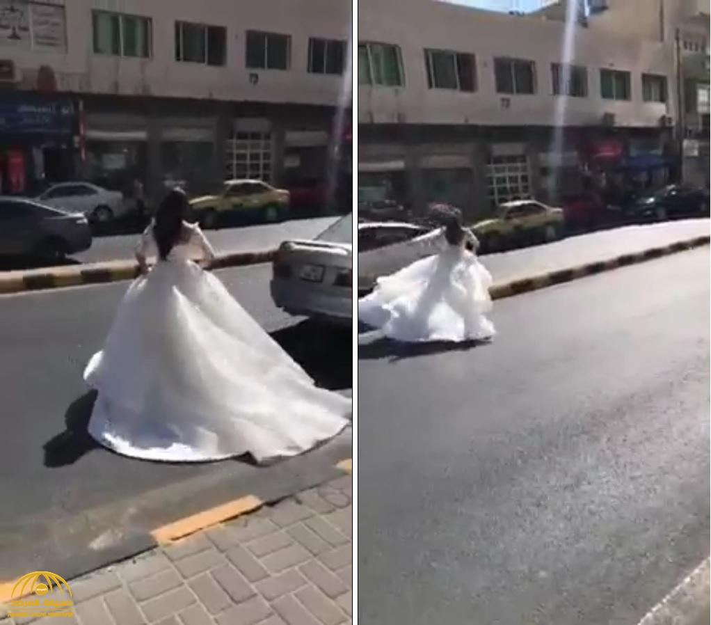 شاهد .. عروس بفستان الزفاف تركض “هاربة” في شارع عام .. لسبب غريب!