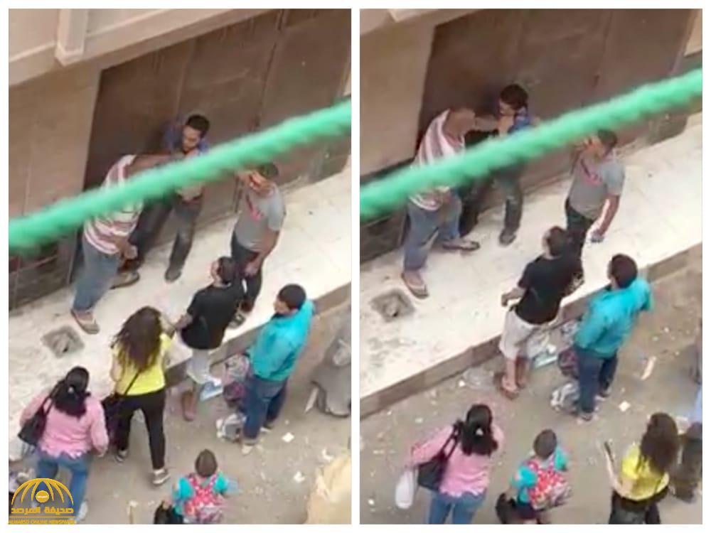 شاهد : محاصرة شاب تحرش بامرأة في مصر .. ورجل يقبض عليه ويصفعه على وجهه