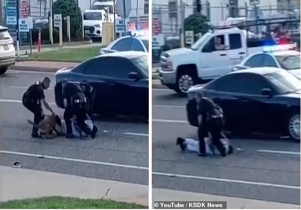 شاهد: عناصر من الشرطة الأمريكية يطلقون كلب على شخص من أصول أفريقية