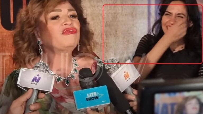 شاهد.. ردة فعل مفاجئة من الفنانة المصرية "إلهام شاهين" على فتاة وقفت خلفها أثناء التصوير!